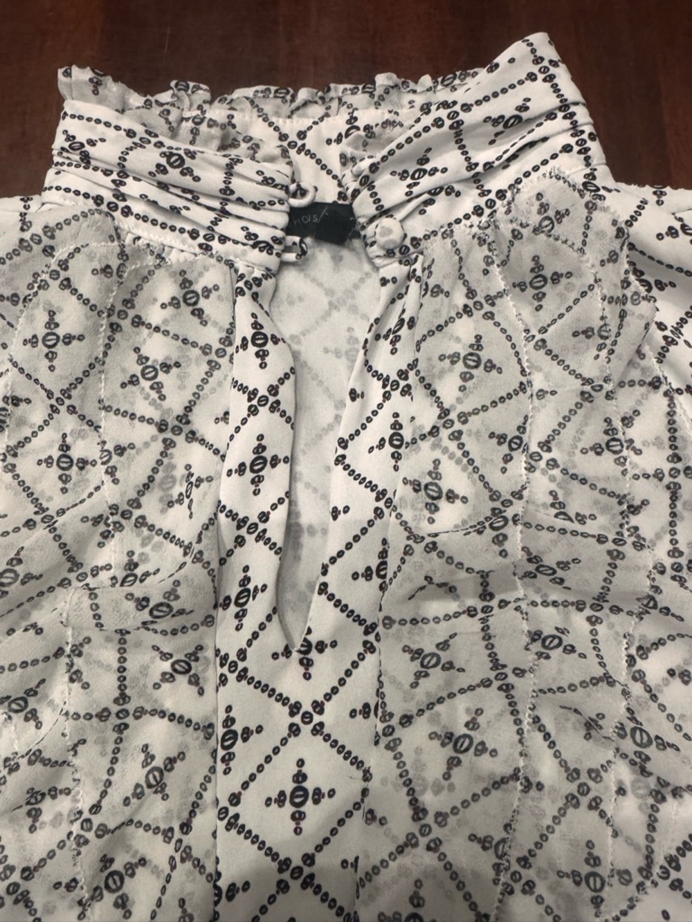 White House Black Market Black & White Geometric Ruffled Sleeveless Blouse - Picture 2 of 9